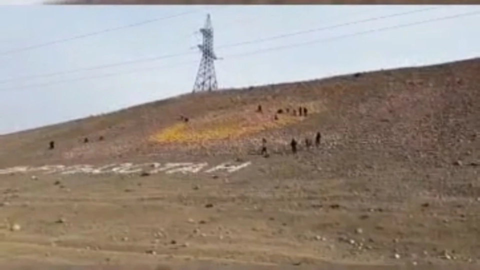 In the Kemin District, advertising inscriptions are being removed from the slopes of the mountains.